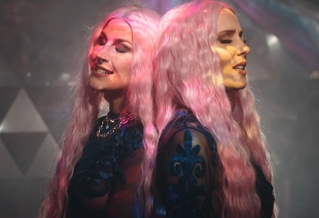 Ex-DELAIN Singer CHARLOTTE WESSELS Teams Up With EPICA’s SIMONE SIMONS For New Single ‘Dopamine’ [Video]