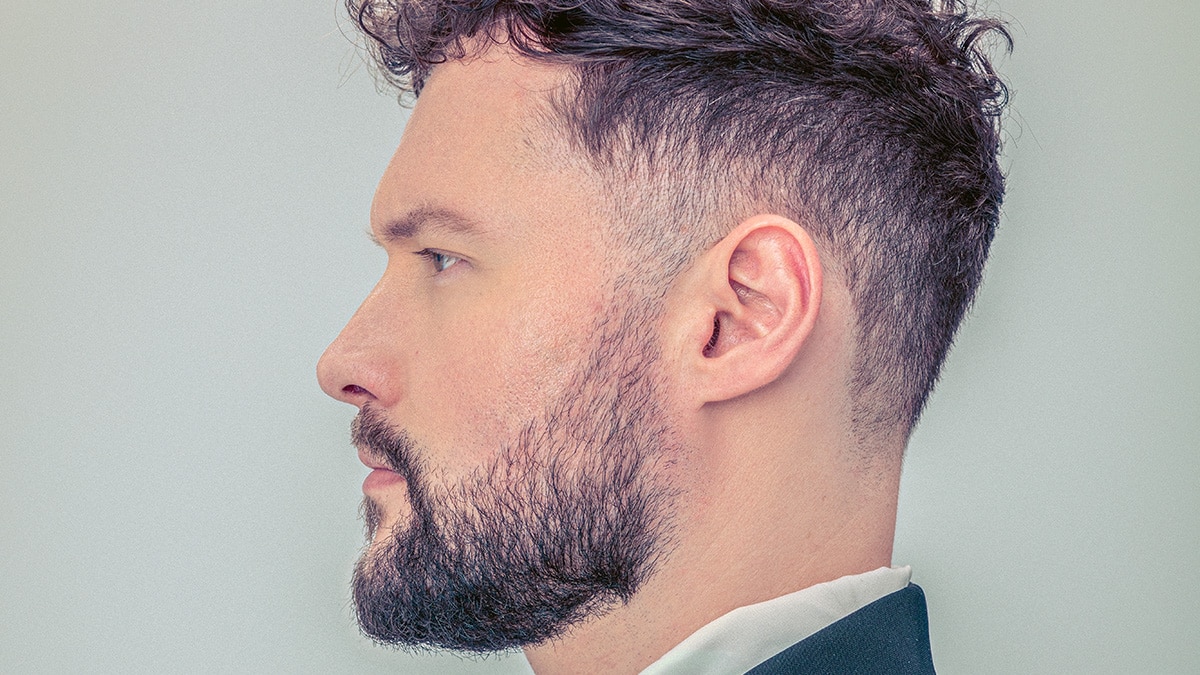 Calum Scott drops uptempo feel-good summer tune ‘Roots’ [Video]